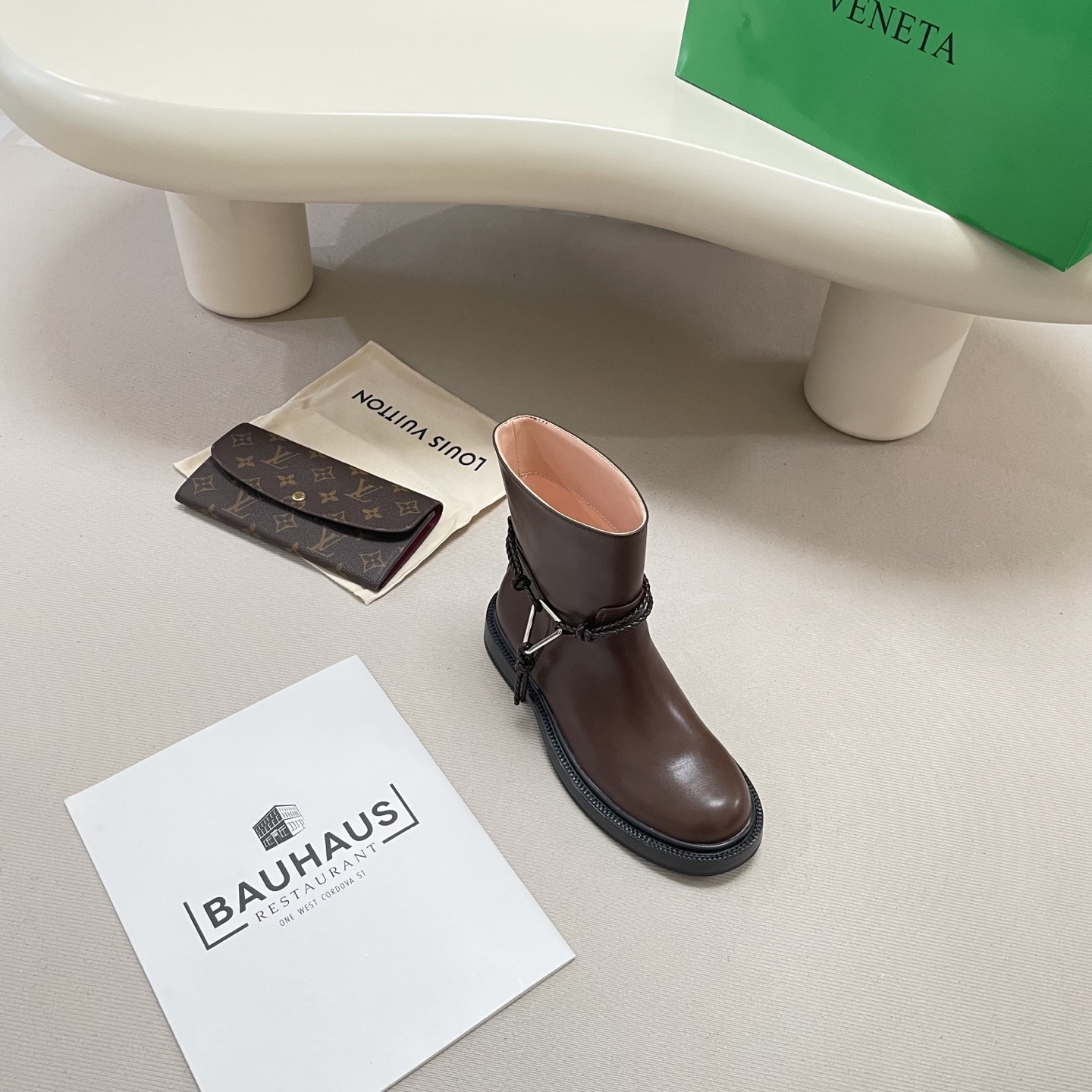 Knotted combat boots