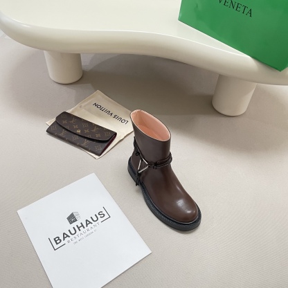 Knotted combat boots