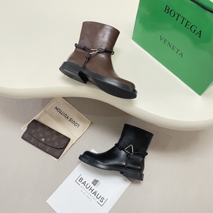 Knotted combat boots