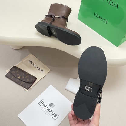 Knotted combat boots