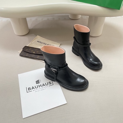 Knotted combat boots