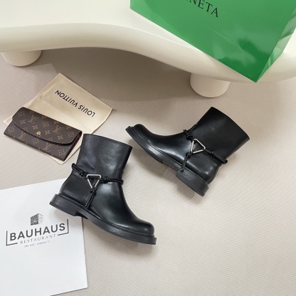 Knotted combat boots