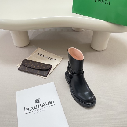 Knotted combat boots