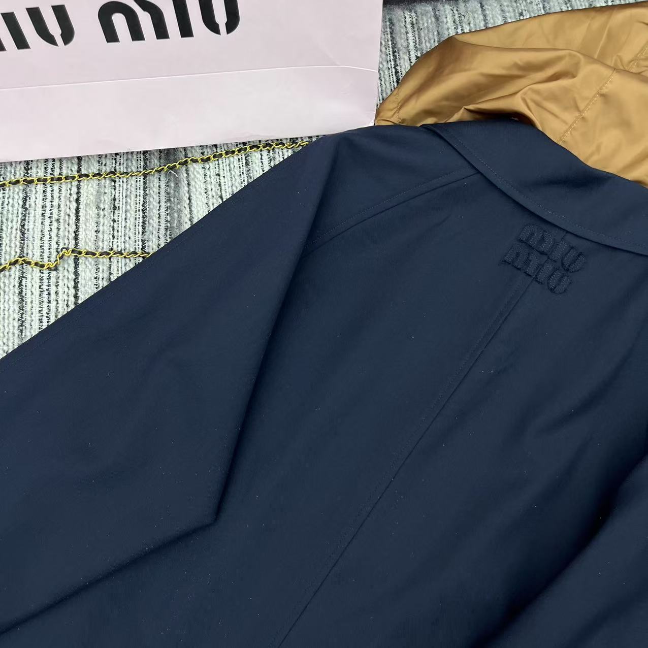 Reversible long hooded trench coat