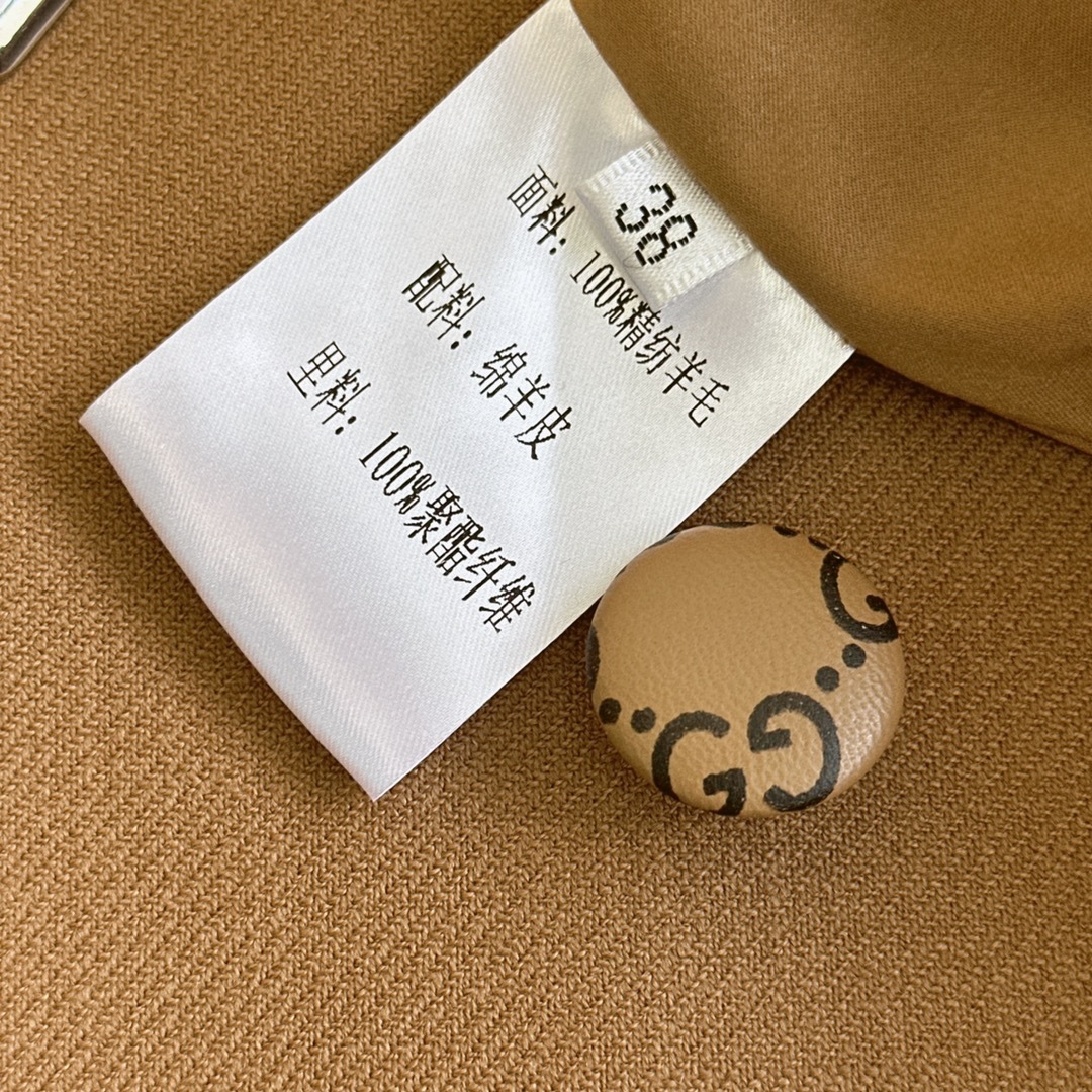 Leather-trimmed mid-length trench coat