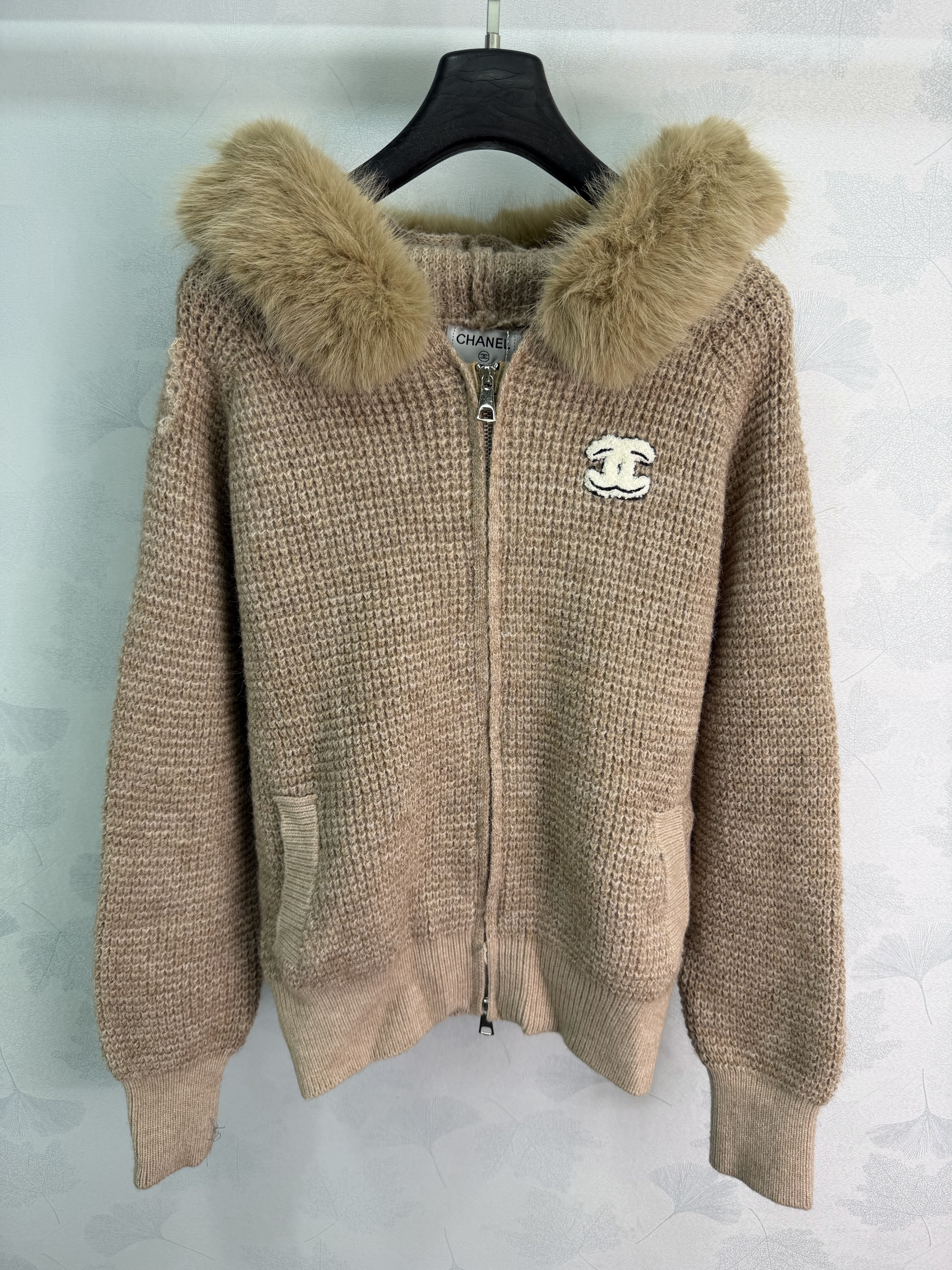 Knitted cardigan with detachable hood and faux-fur collar