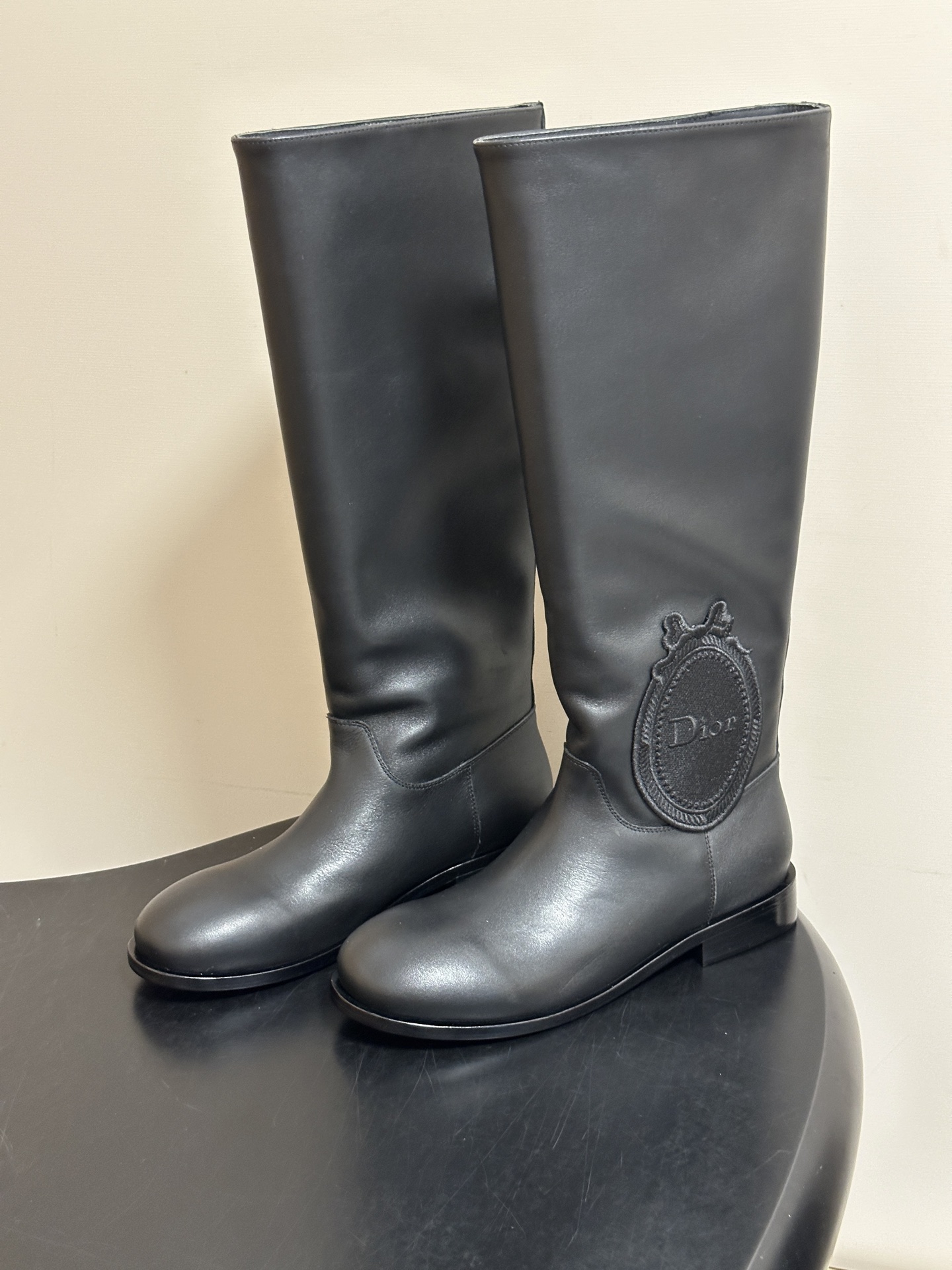 Letter-embroidered slip-on straight-leg boots with buckle detail 35-42
