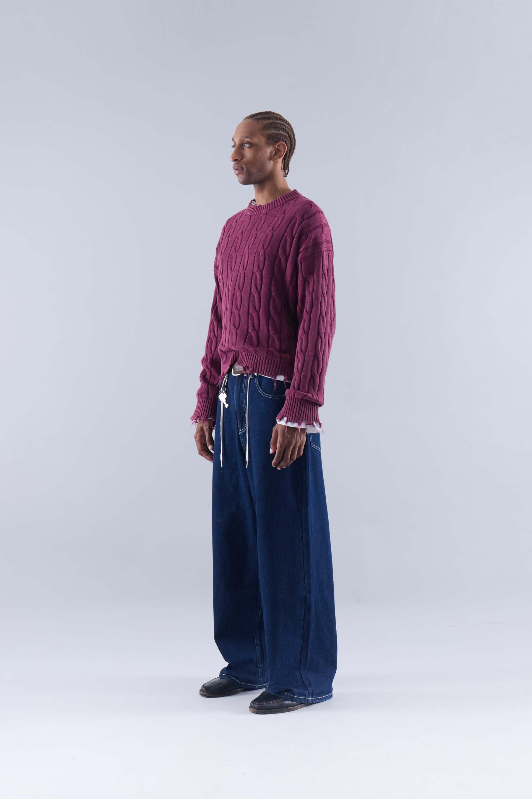 CABLE KNIT DISTRESSED SWEATER