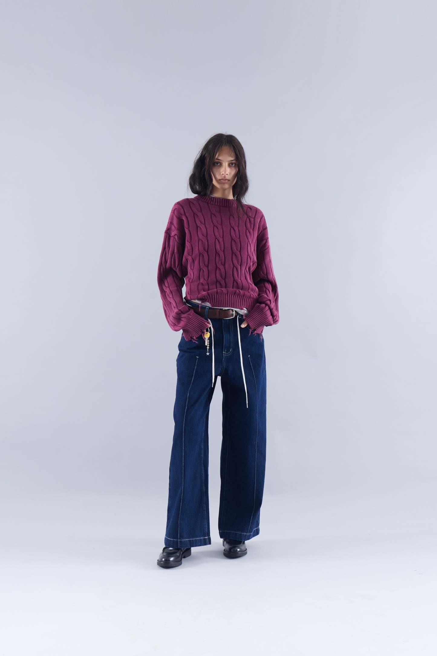 CABLE KNIT DISTRESSED SWEATER