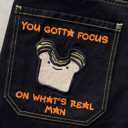 Cartoon embroidered jeans