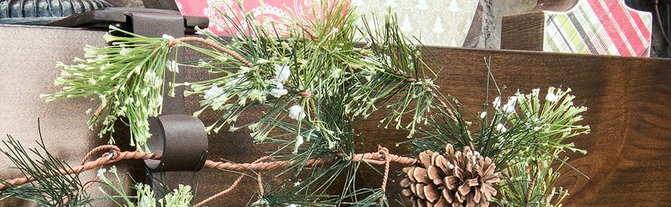Mantle Hanger fireplace stocking and garland hanger holding a garland in the top hook