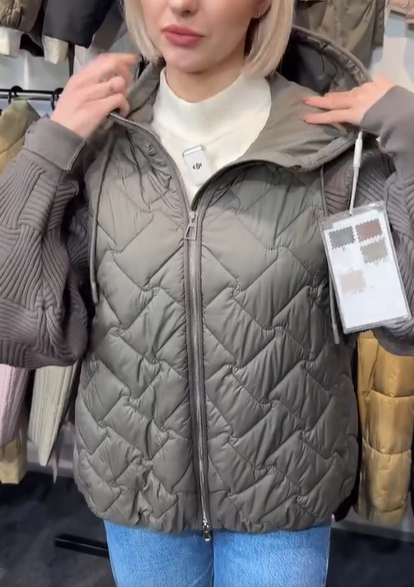 Quilted Jacket with Knit Sleeves and Hood