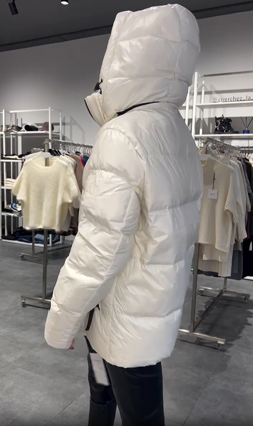 Thick hooded down jacket with built-in shoulder straps