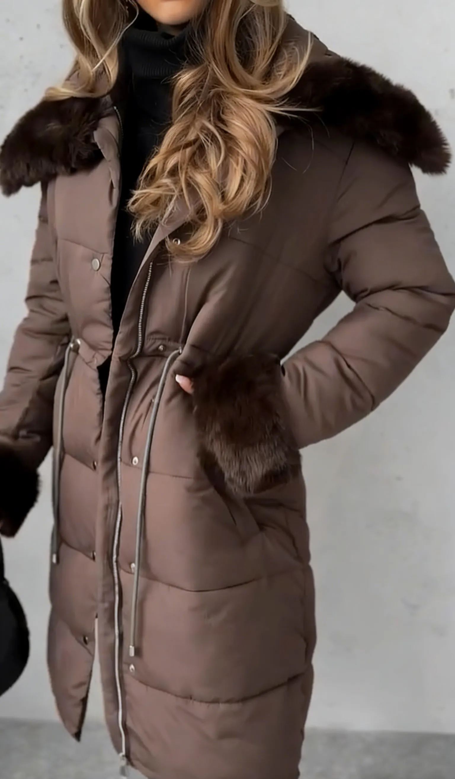Mid-length down jacket with hood, accented with faux fur trim