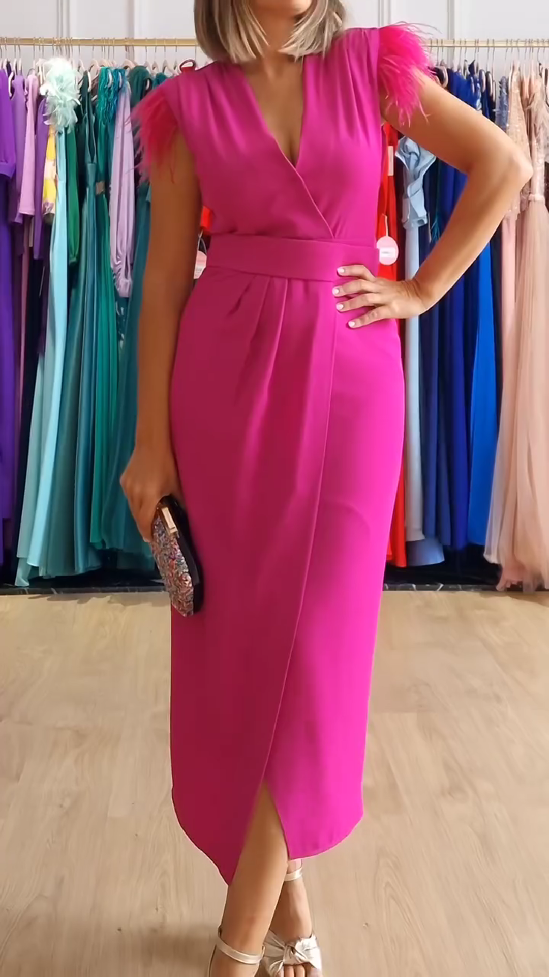 Wrap dress with feathers on the shoulders