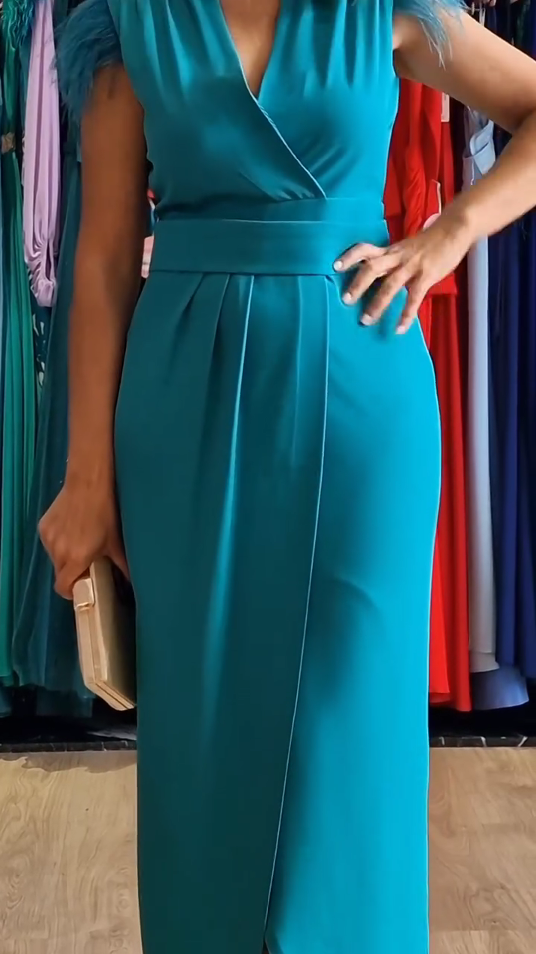 Wrap dress with feathers on the shoulders
