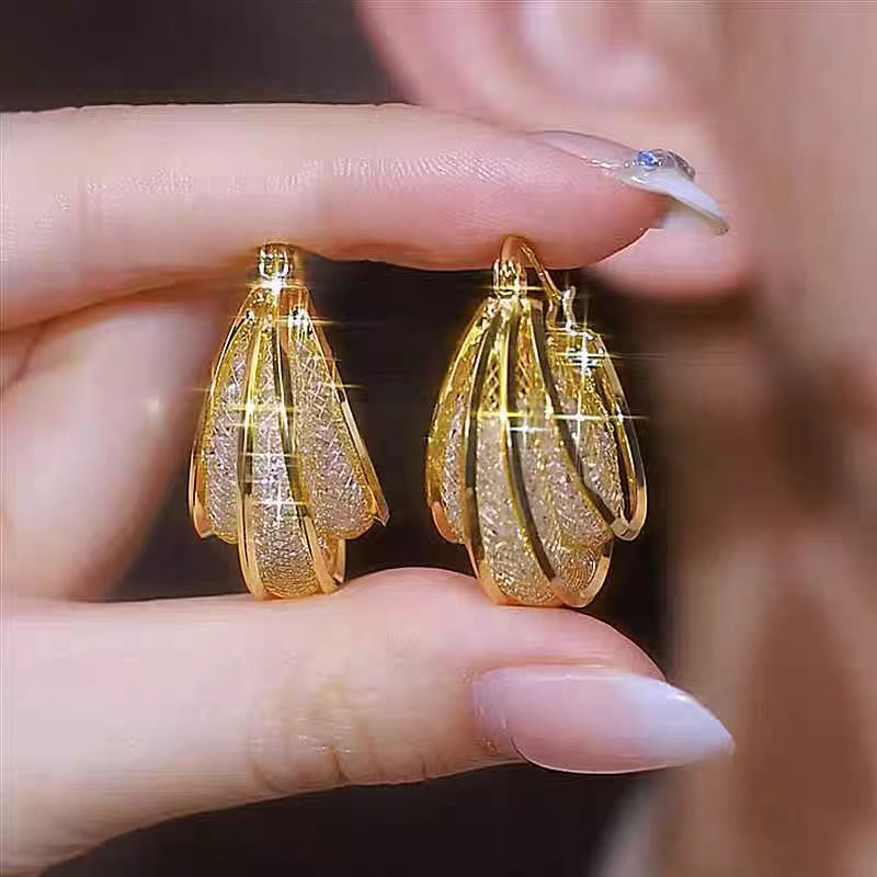 Fashion hollow mesh hoop earrings A Pair
