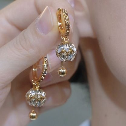 Diamond ball earrings A Pair