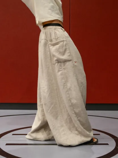 FLAX PLEATED WIDE-LEG PANTS