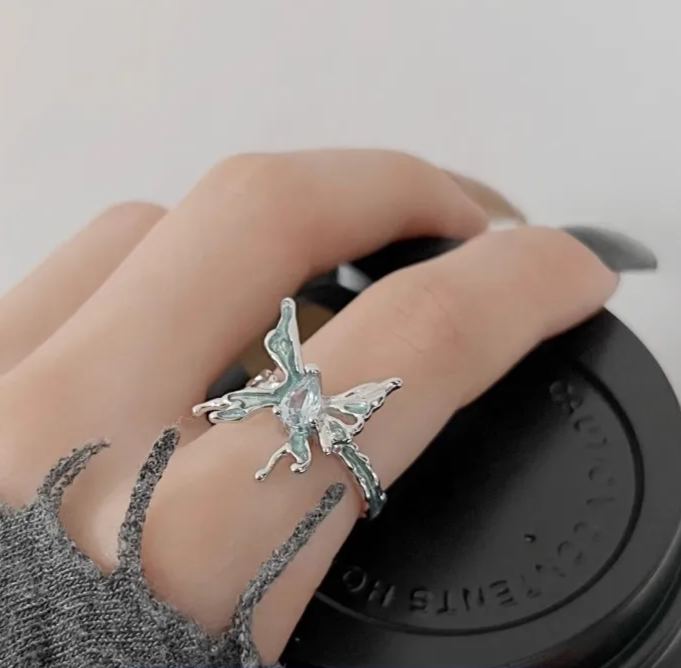 Silver Butterfly Ring with Textured Wings and Gemstone Centerpiece