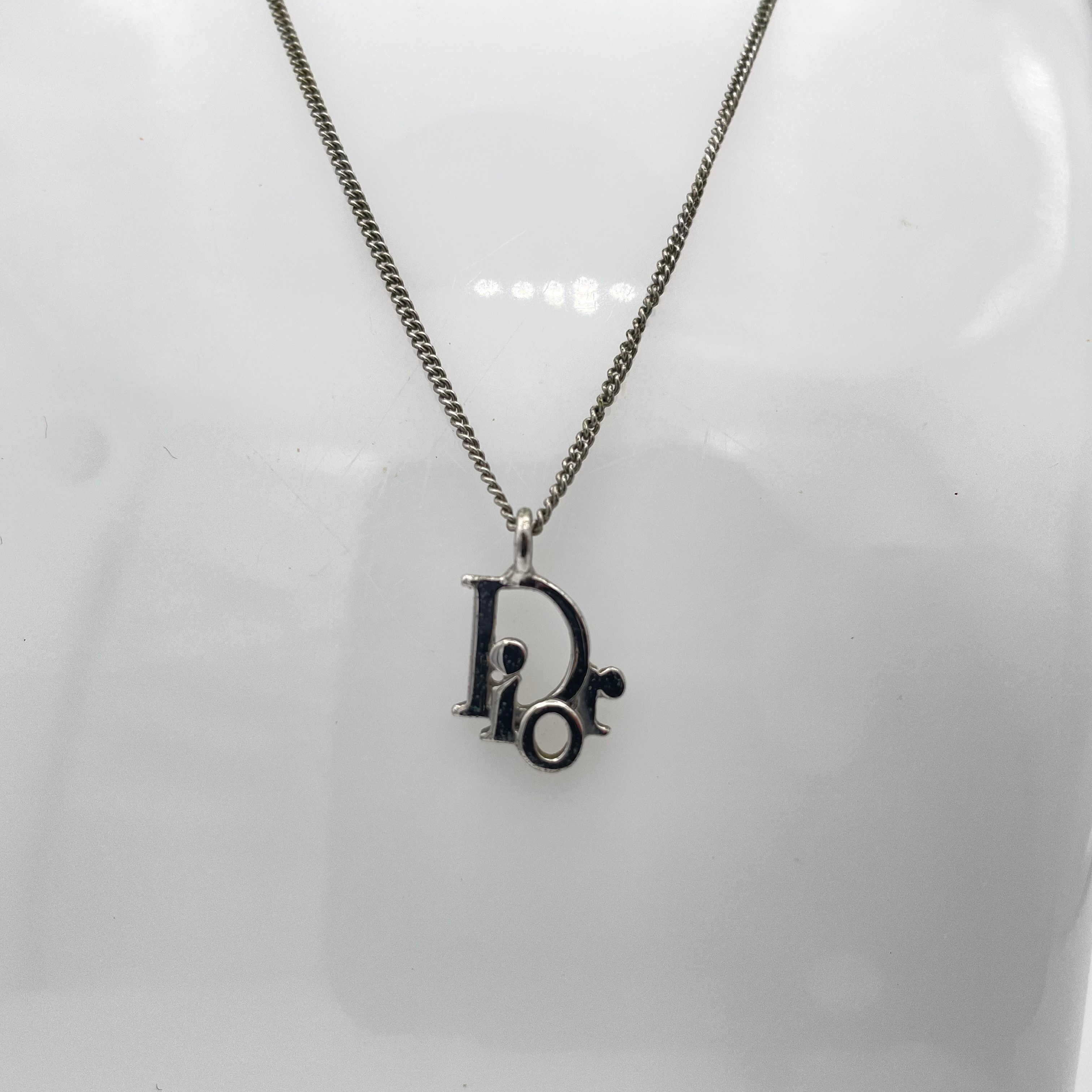 D logo necklace