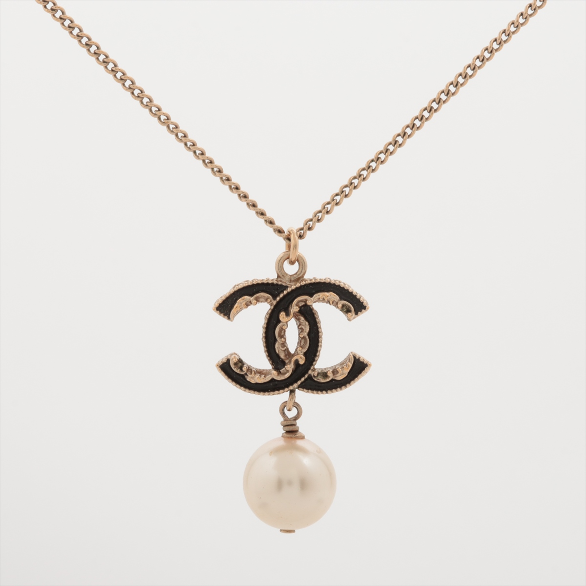 C Black gold wave necklace