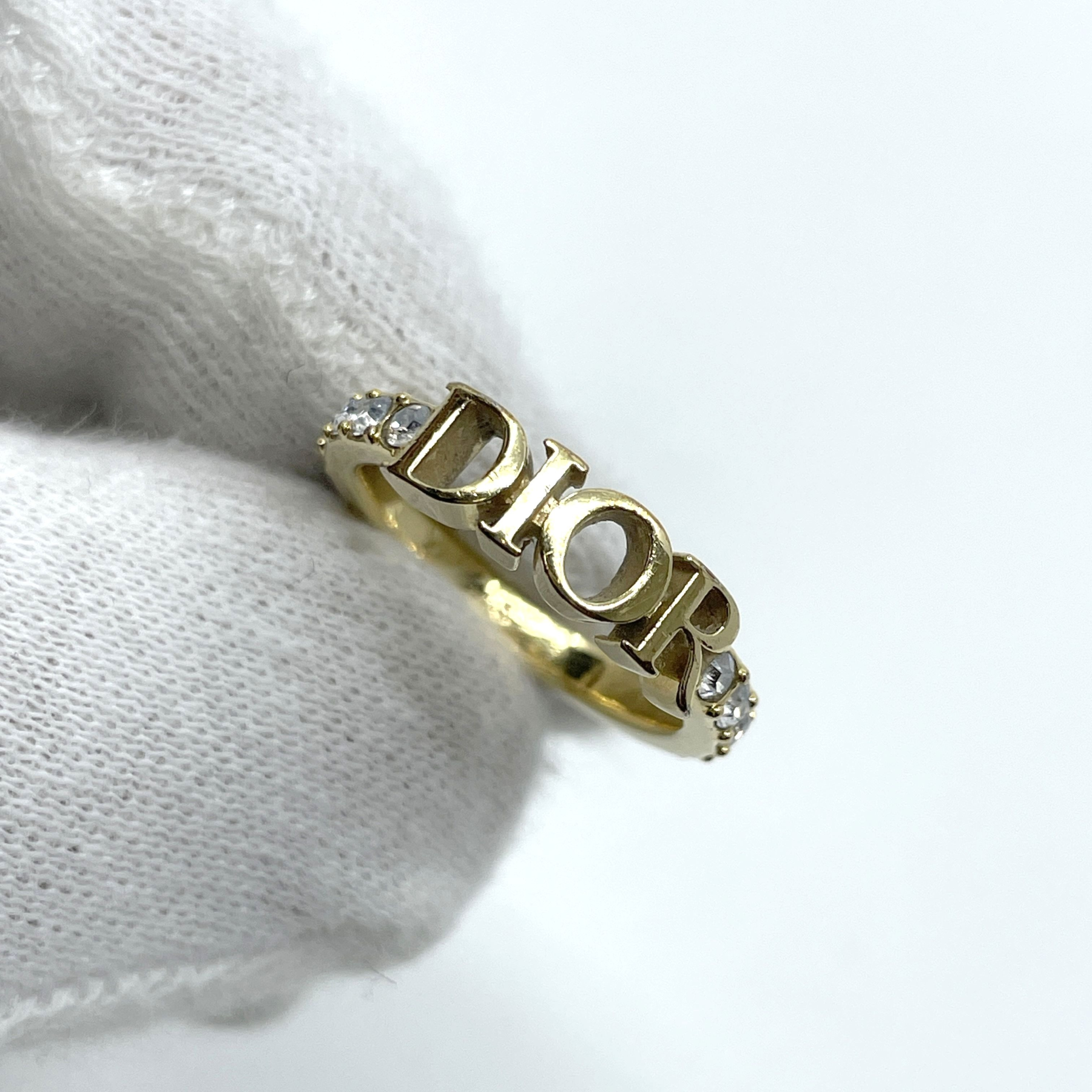 D Gold rhinestone logo ring