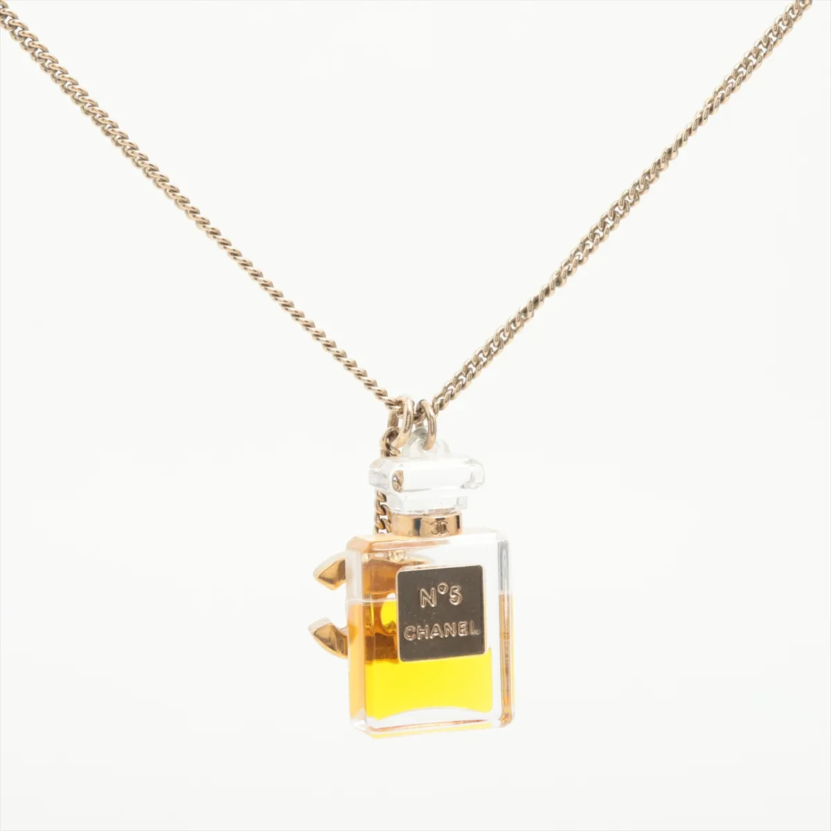 C logo perfume bottle necklace