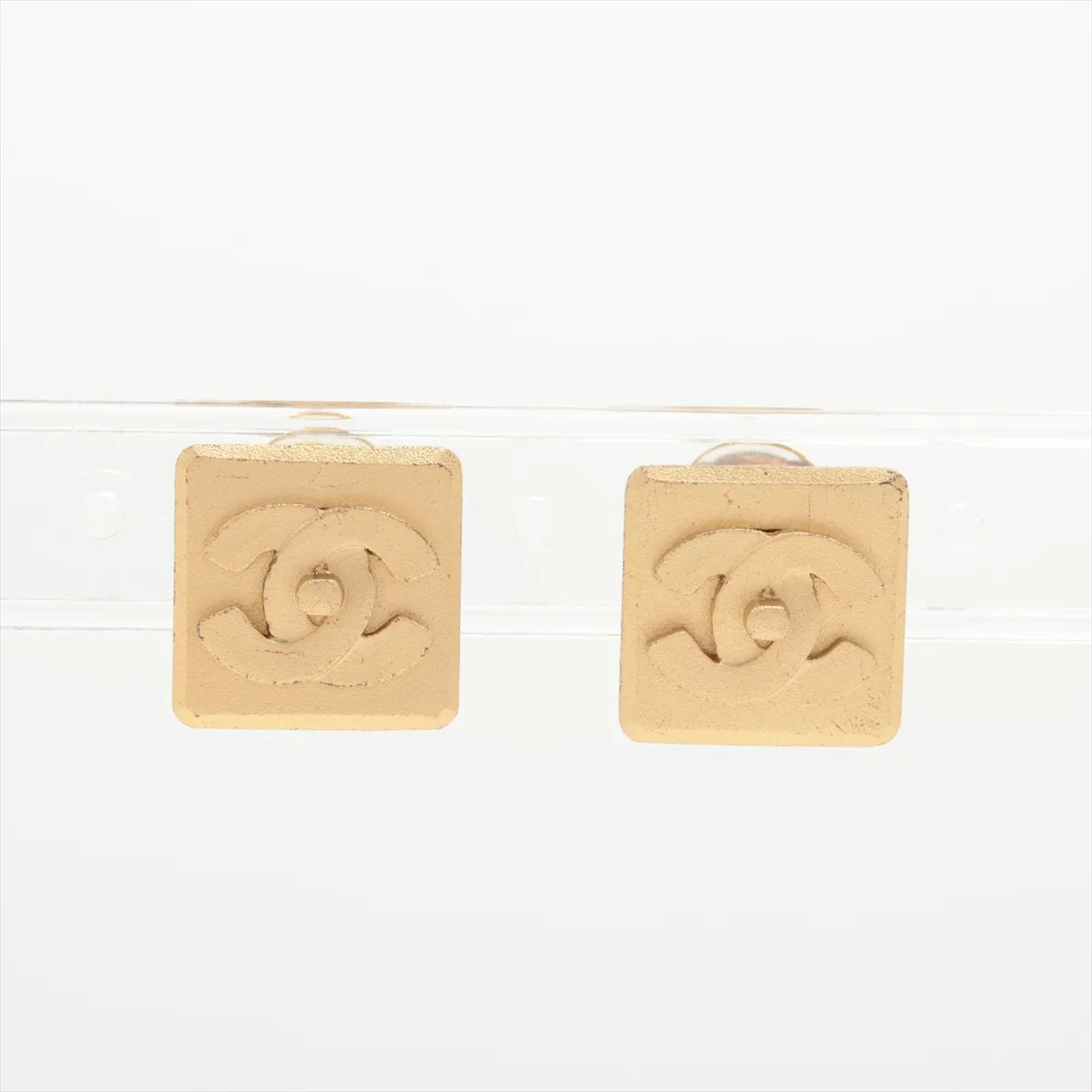 C Square backpack buckle earrings