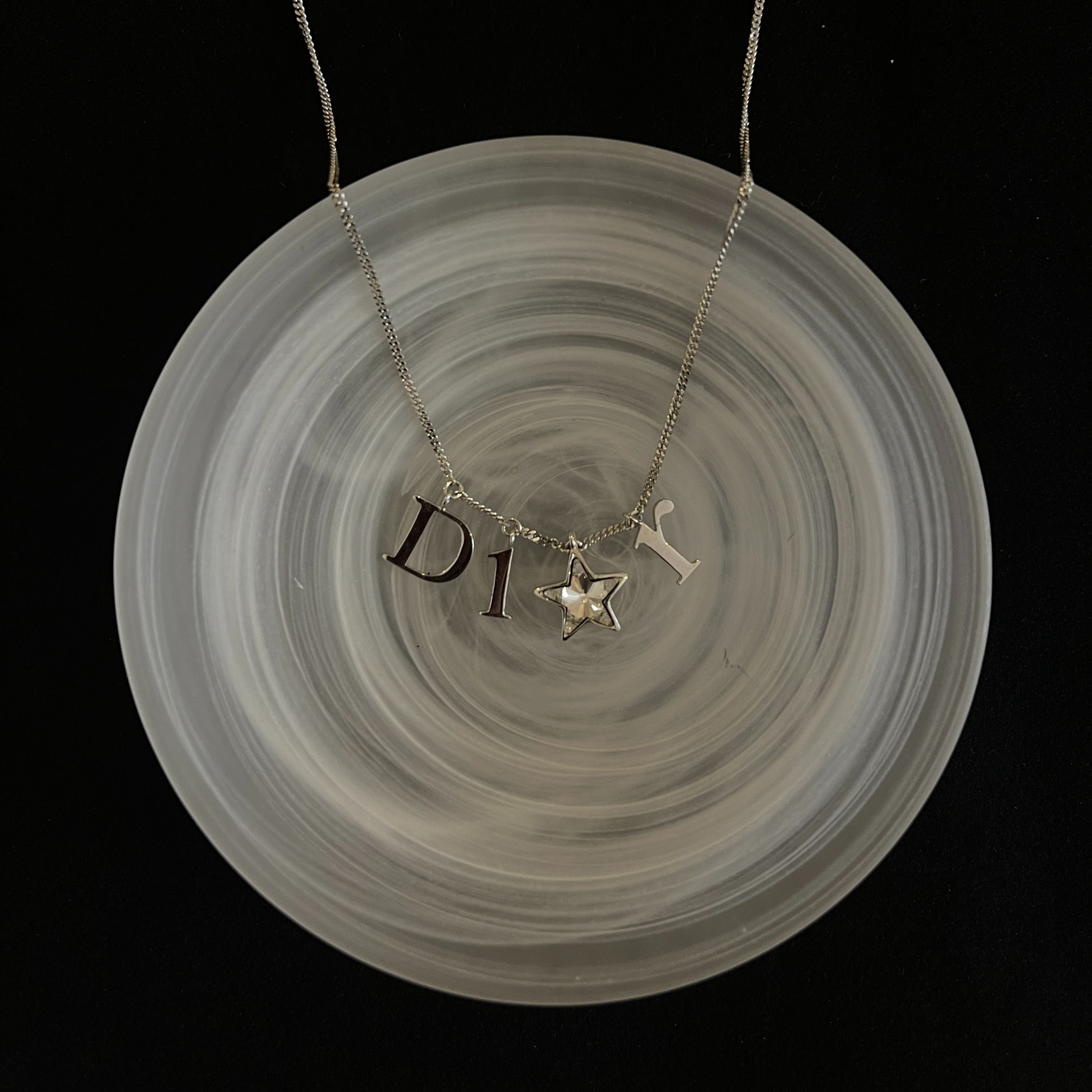 D logo star necklace