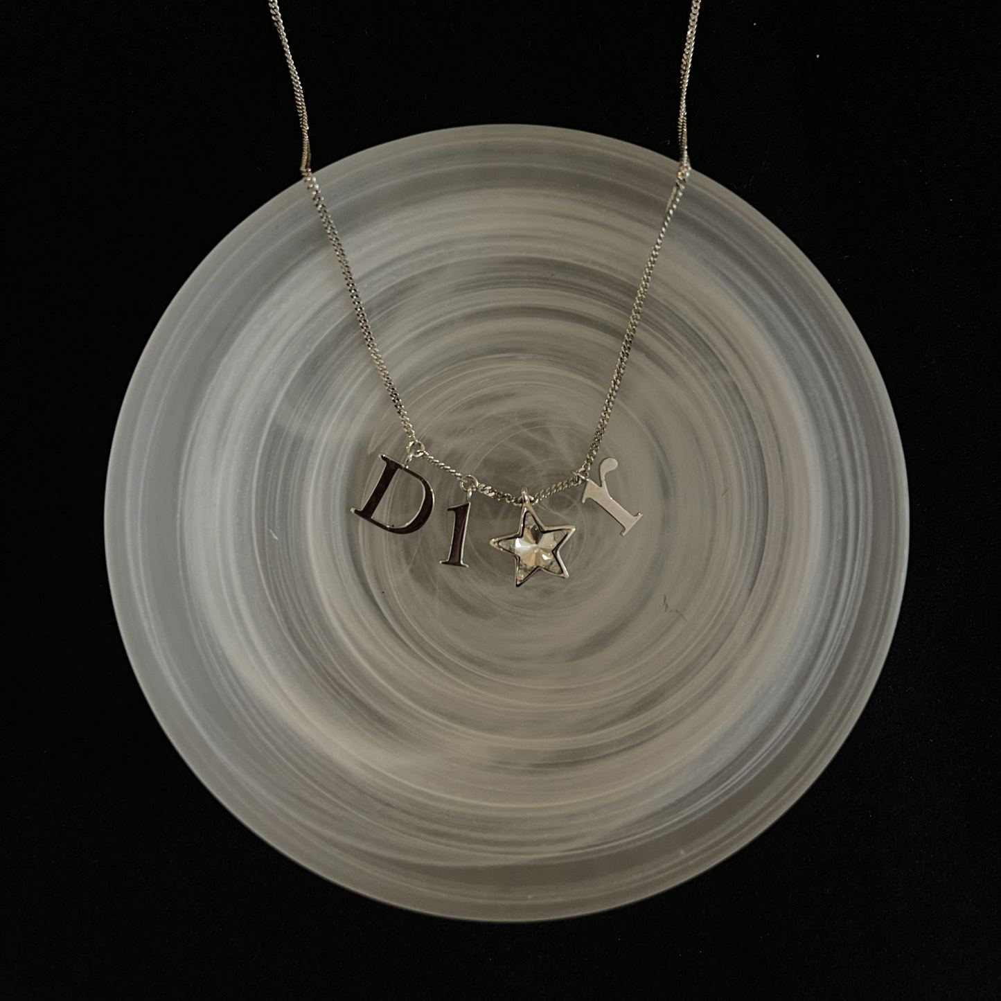 D logo star necklace