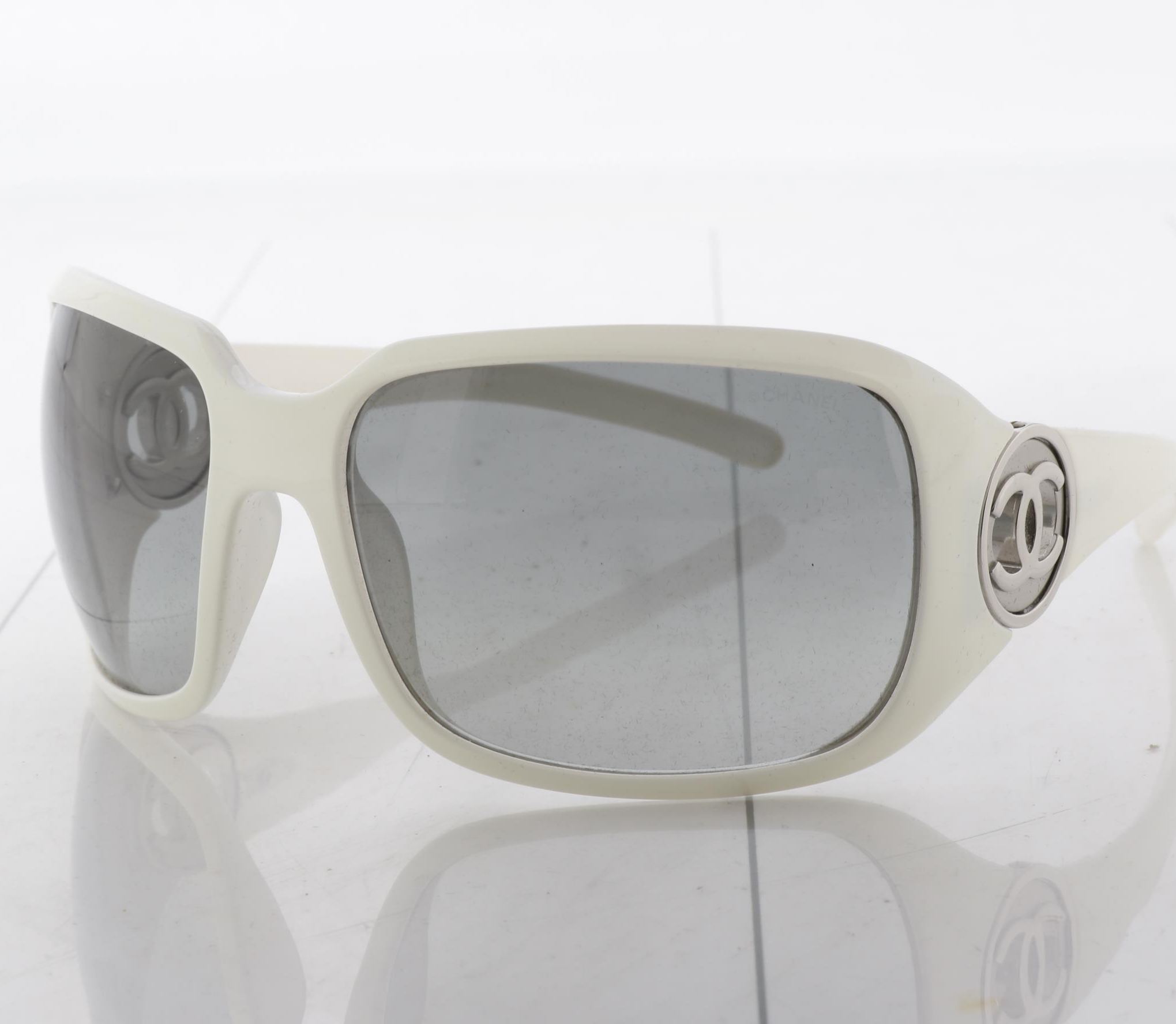 C White motorcycle logo sunglasses