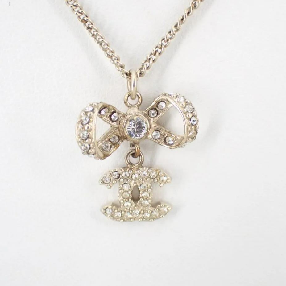 C Diamond bow necklace