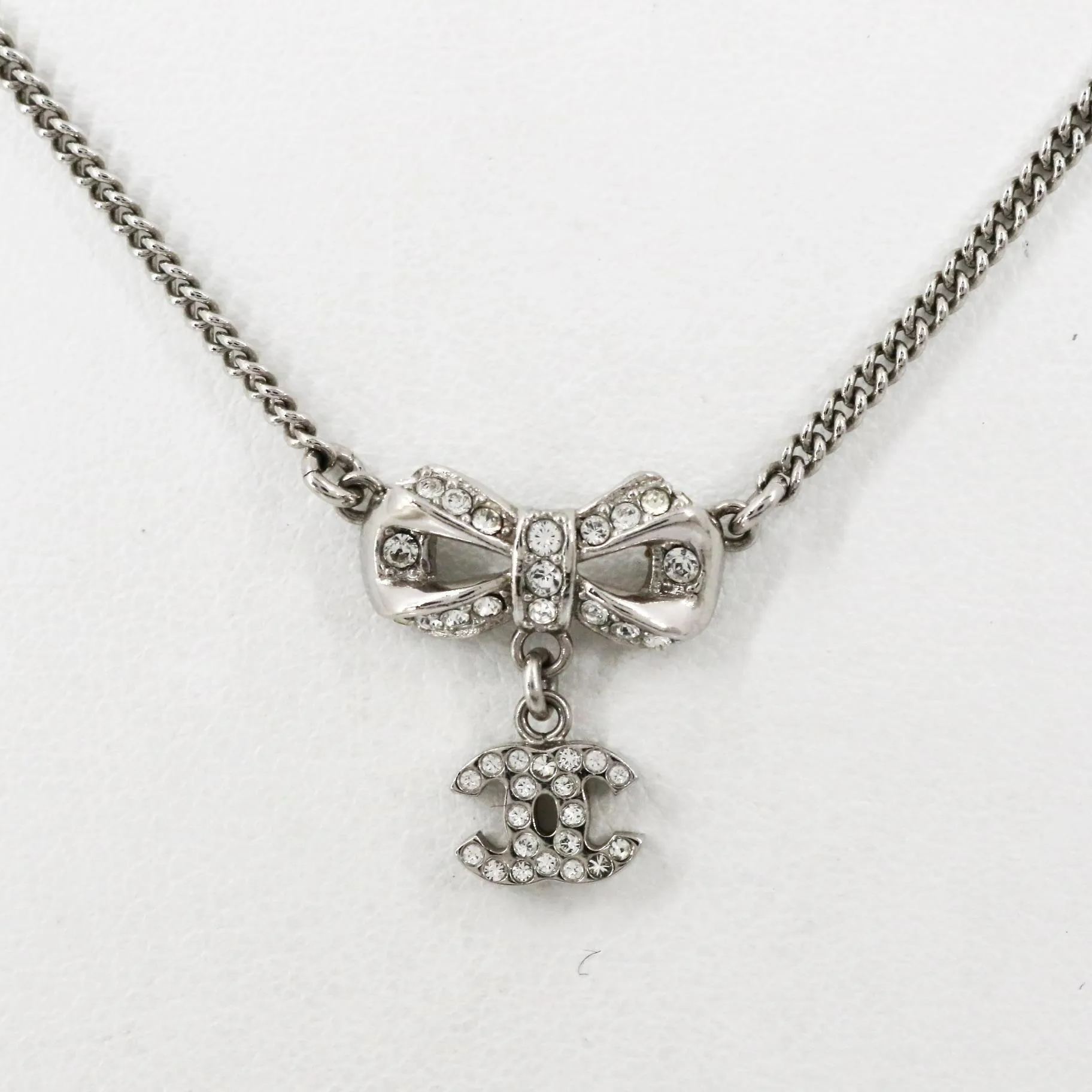 C Bow logo pendant necklace