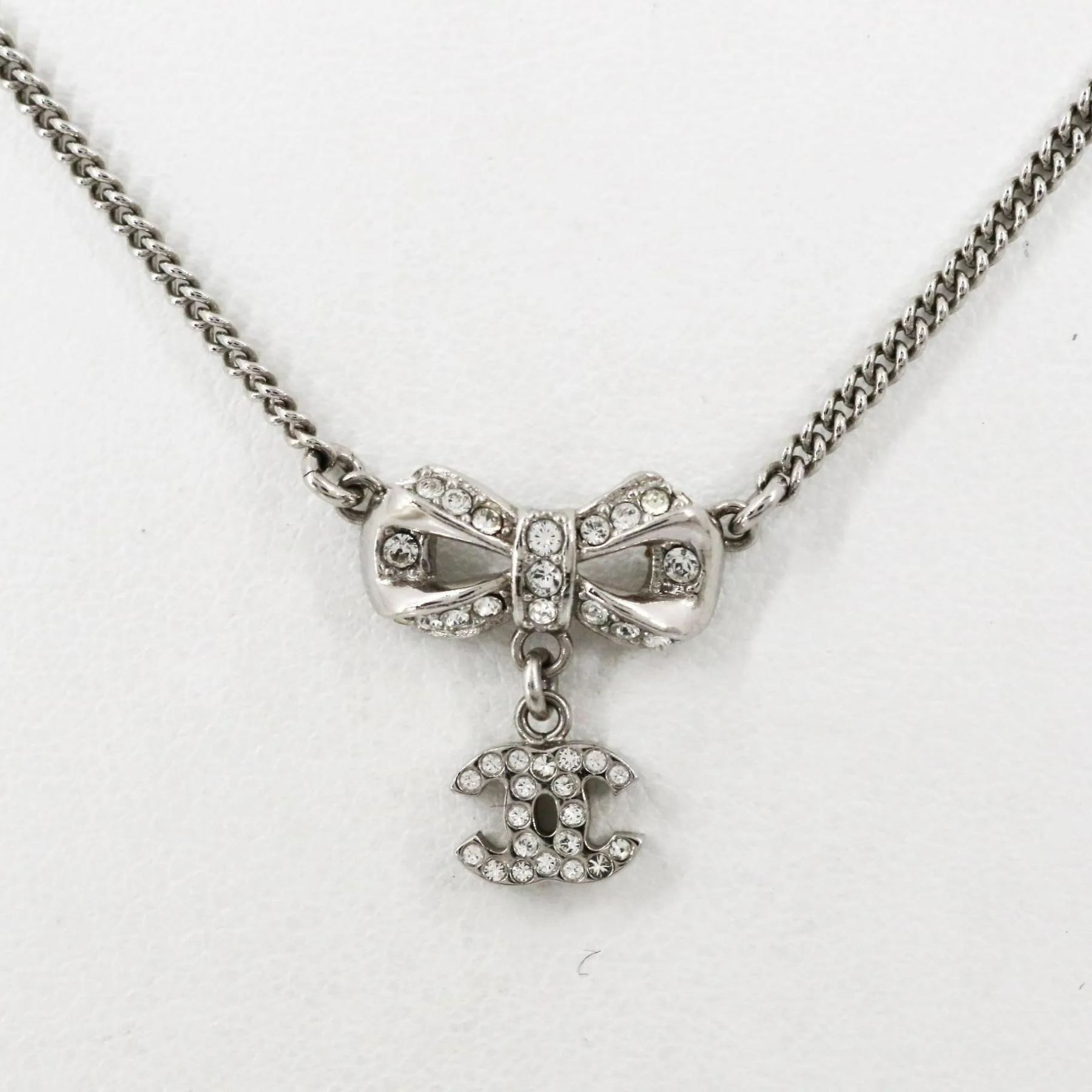 C Bow logo pendant necklace