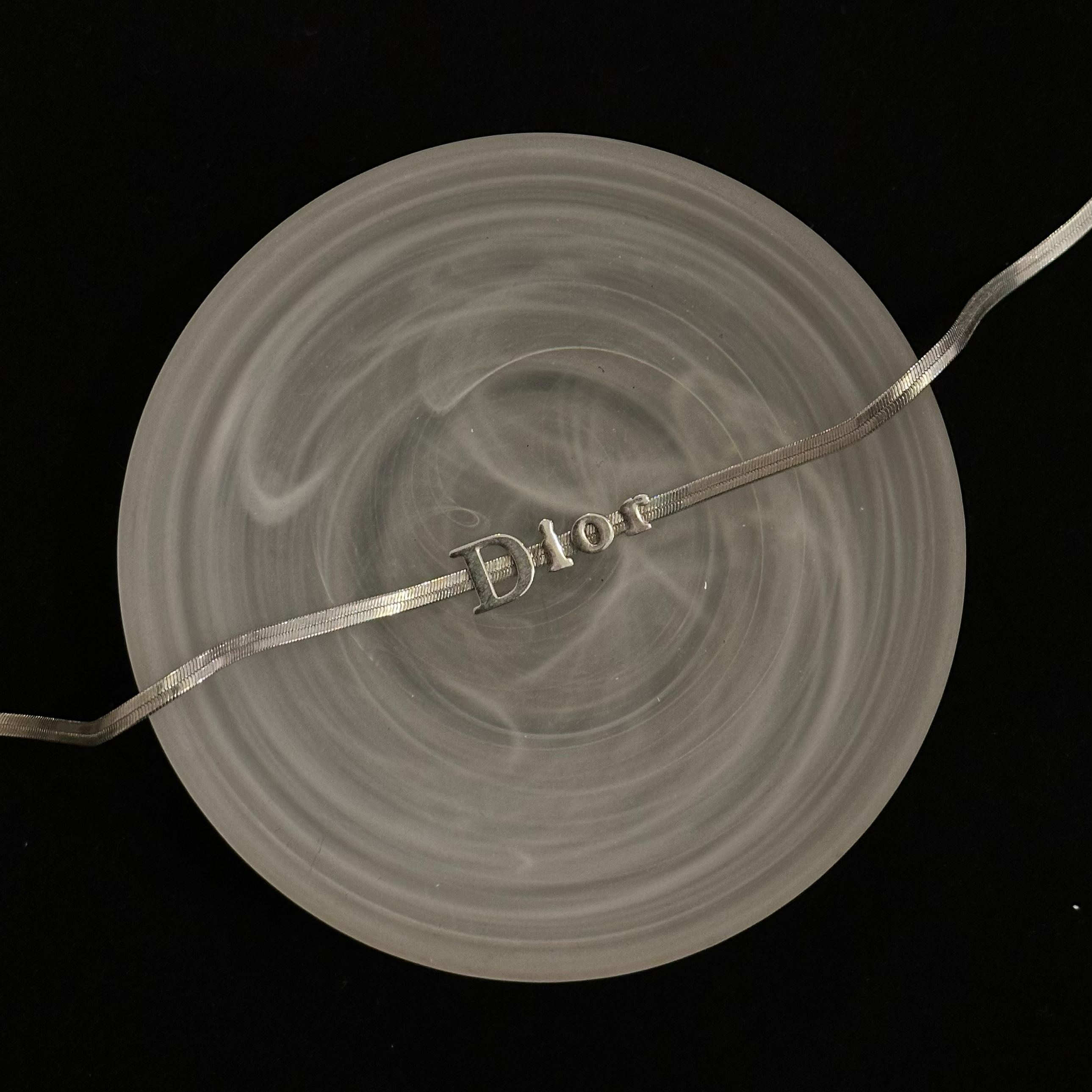 D logo snake bone necklace