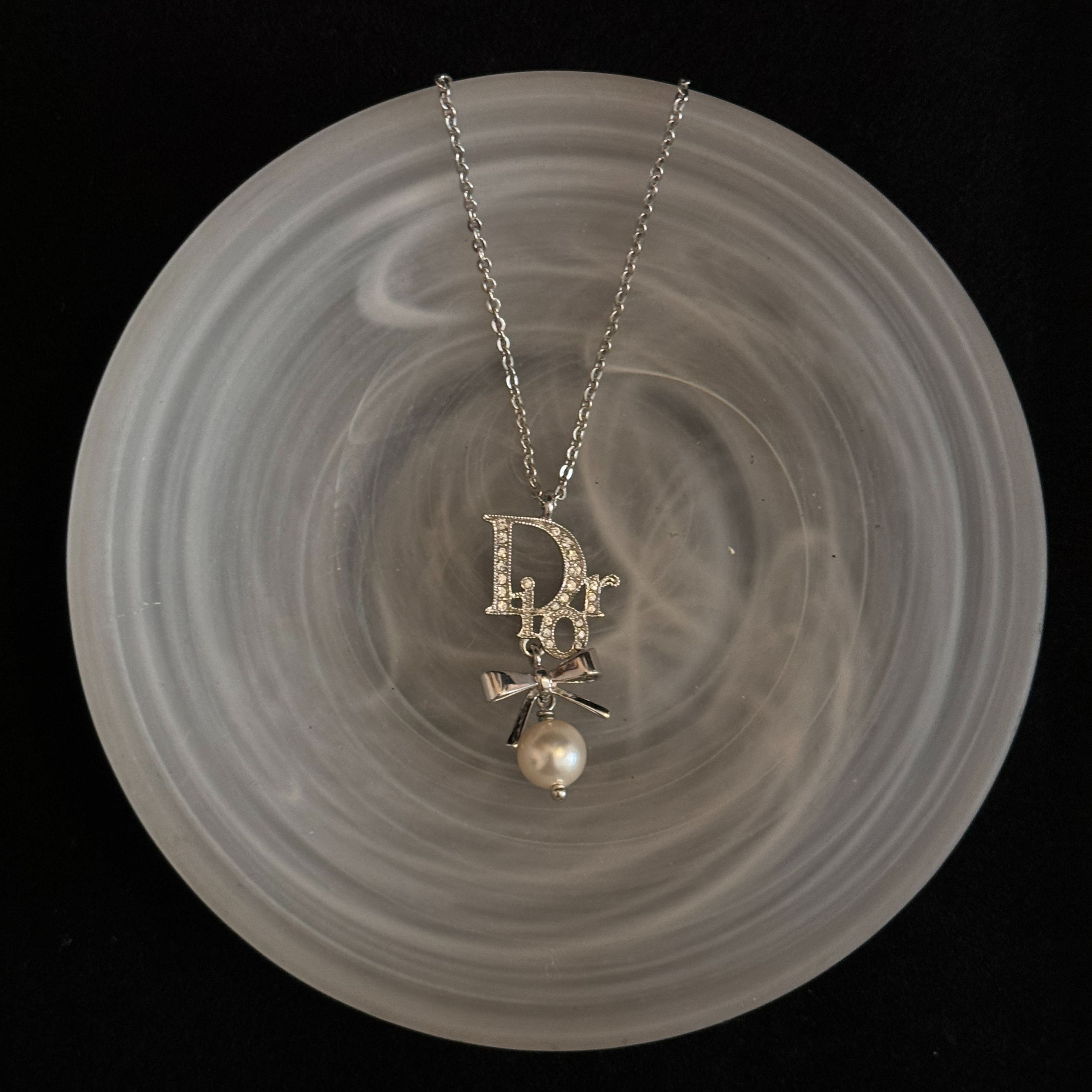 D Diamond logo bow pendant necklace