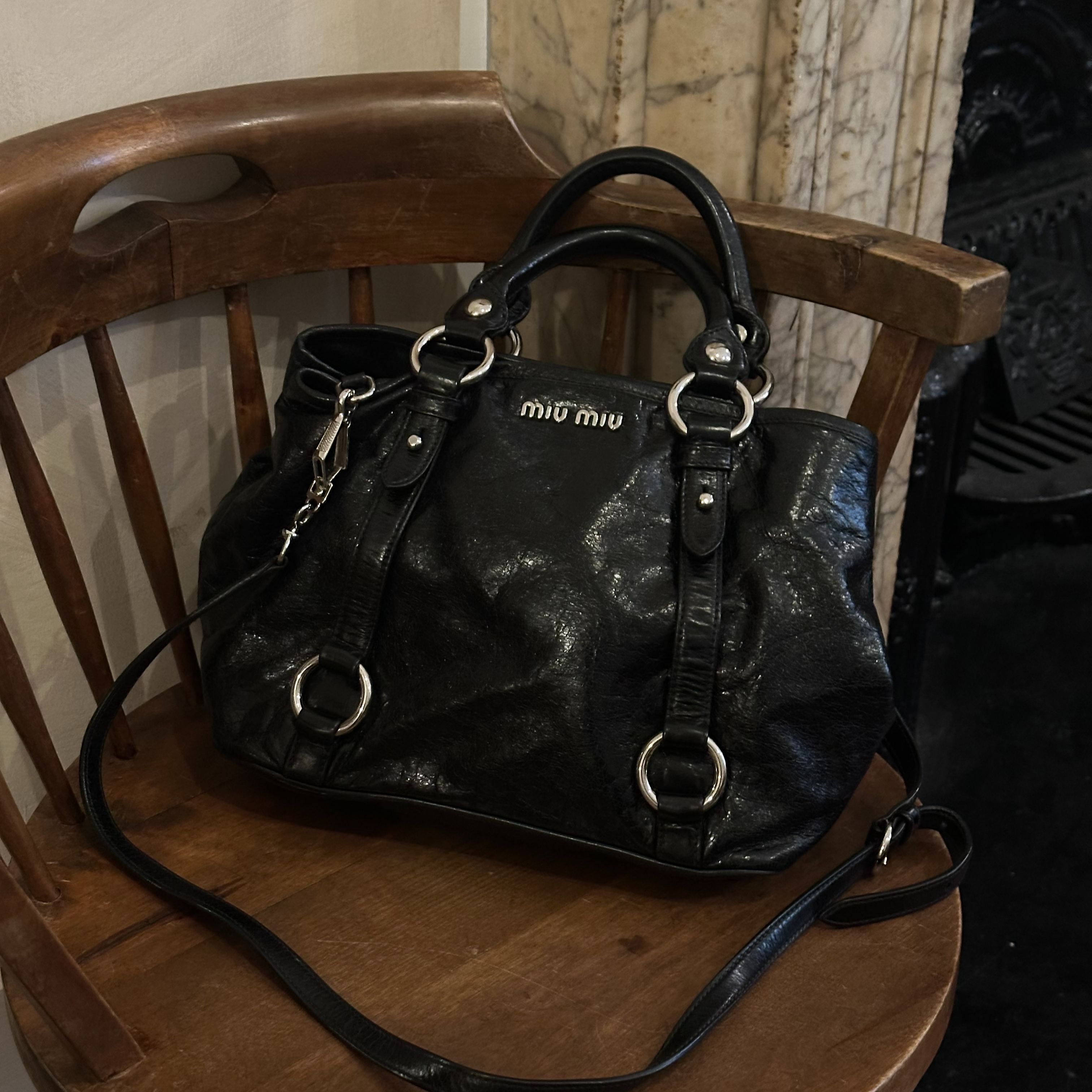 M Black leather hand bag