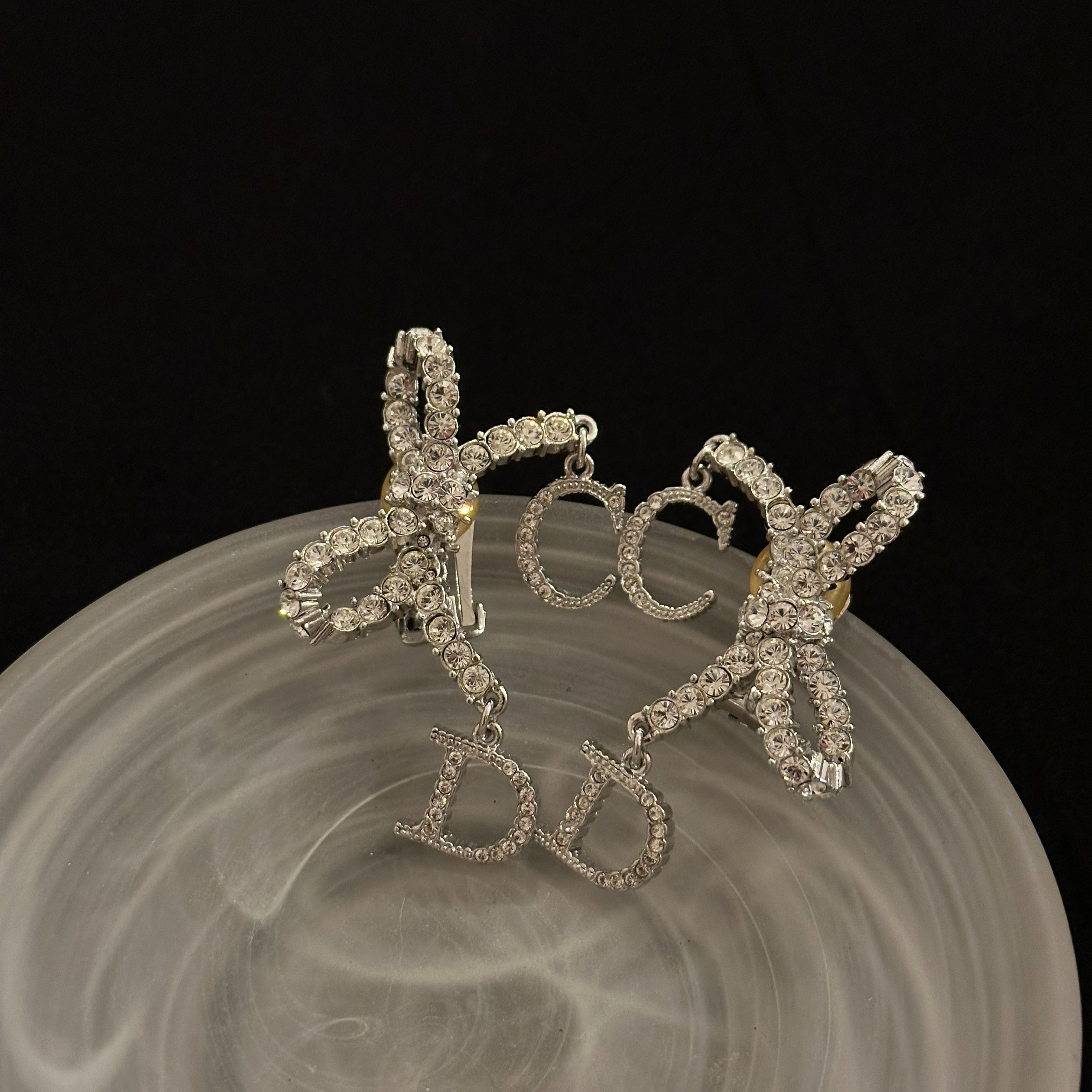 D Diamond bow earrings