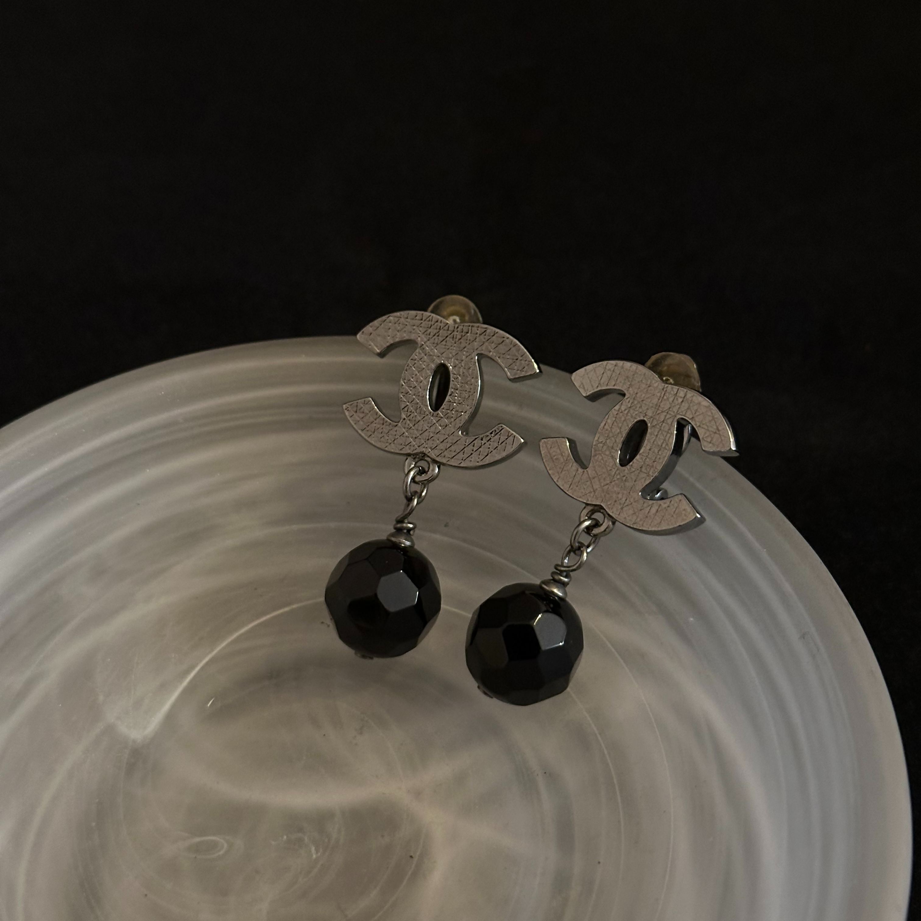 C Double C Acrylic Ball Pendant Ear Clip