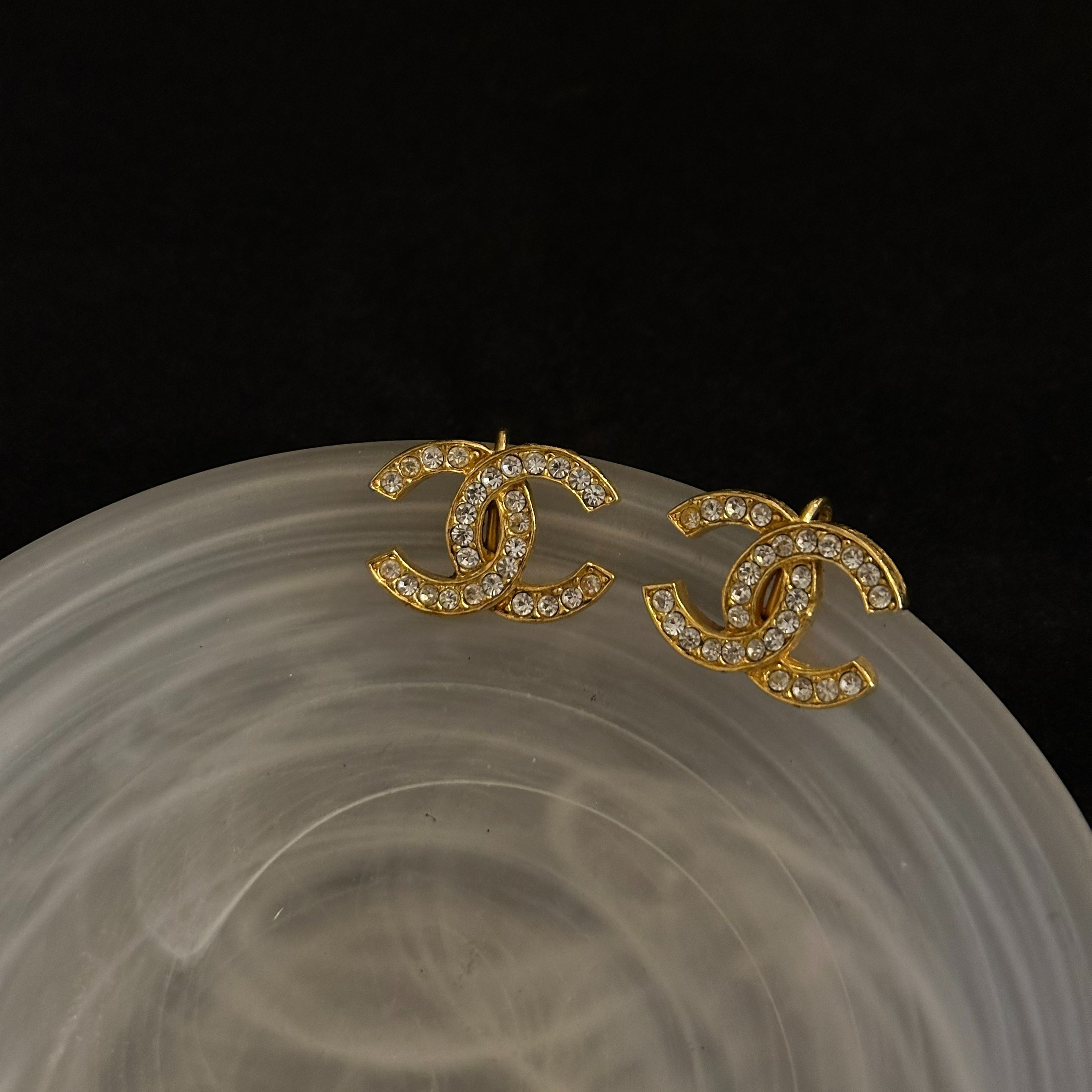 C Double C full diamond gold clip earrings