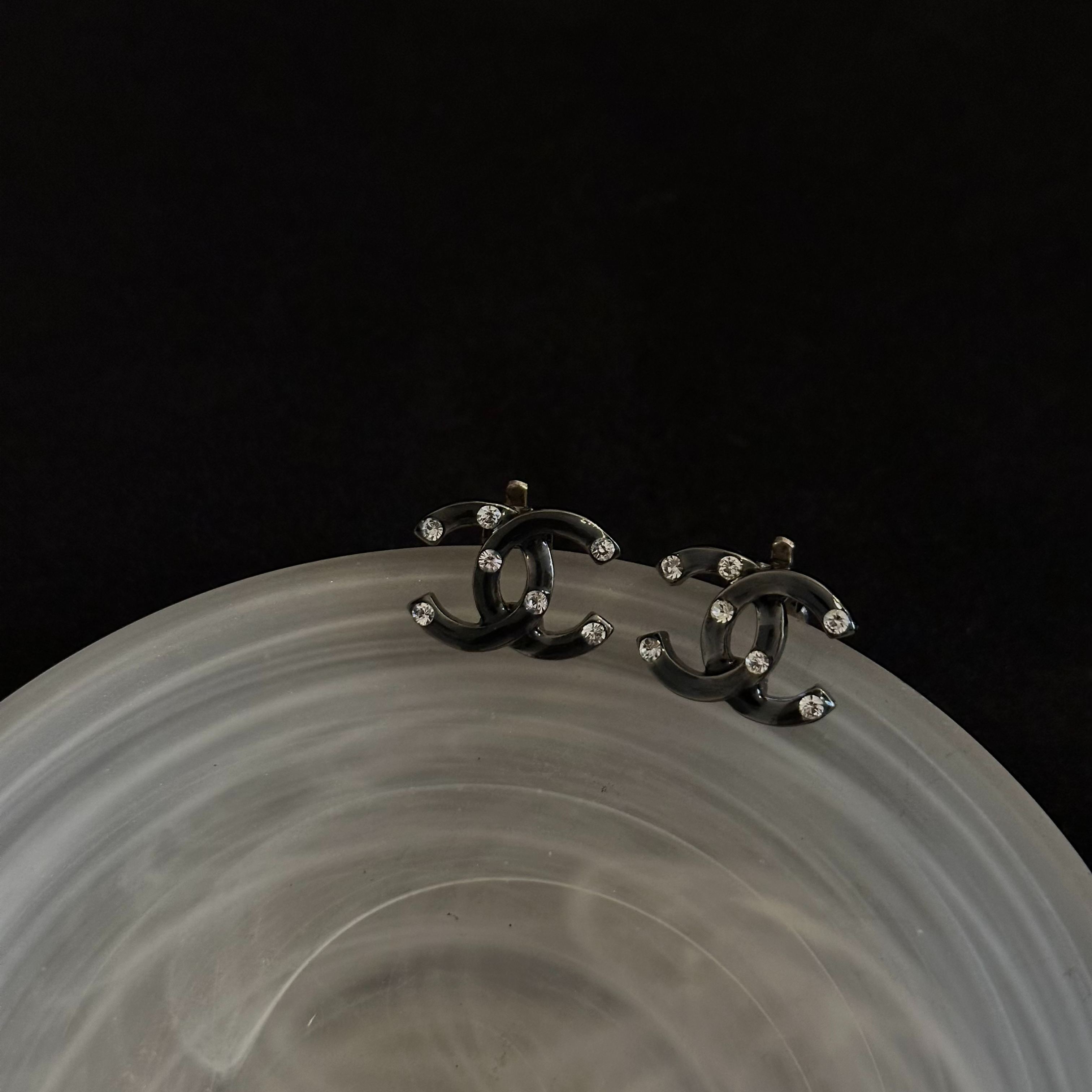 C Double C rhinestone black ear clip