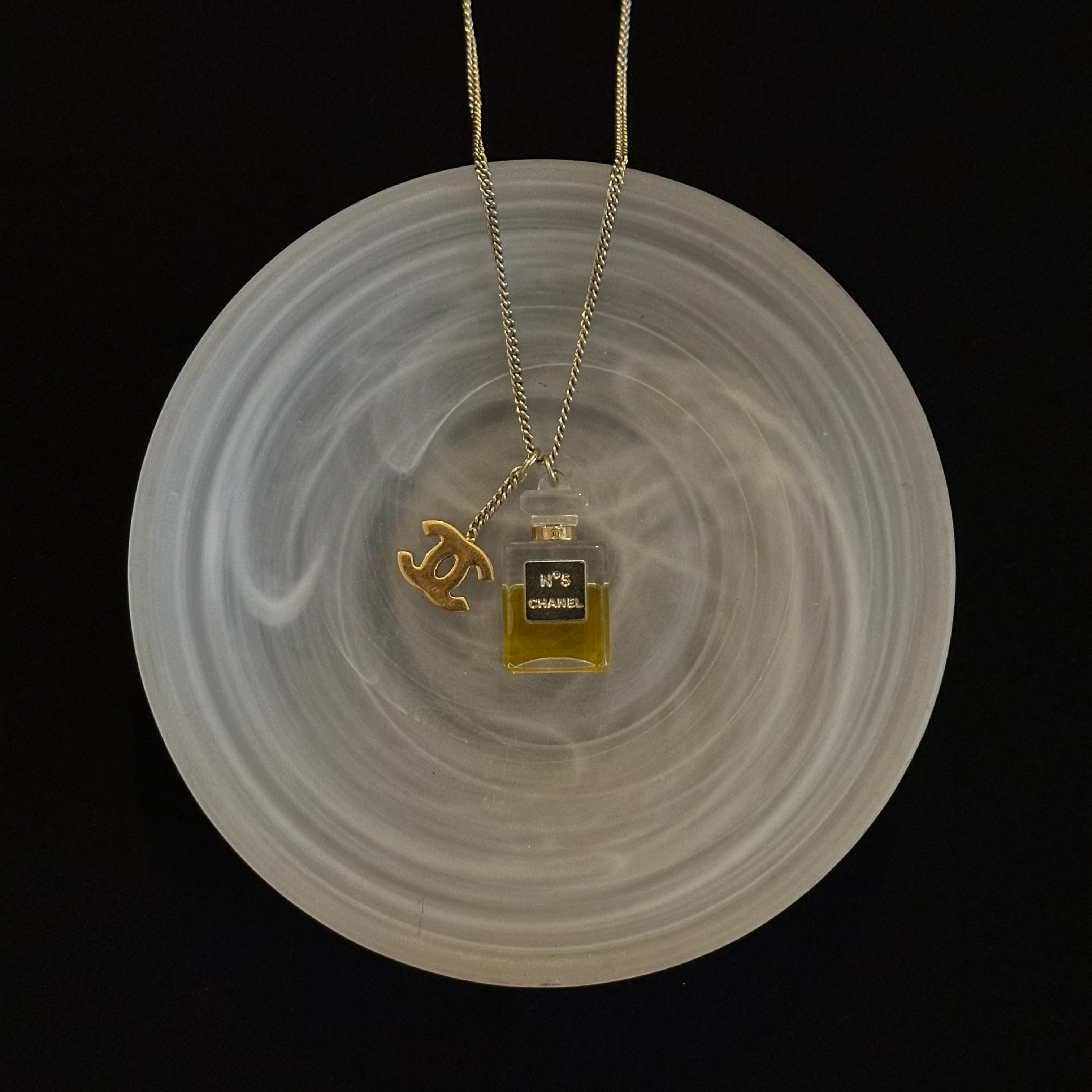 C logo perfume bottle necklace