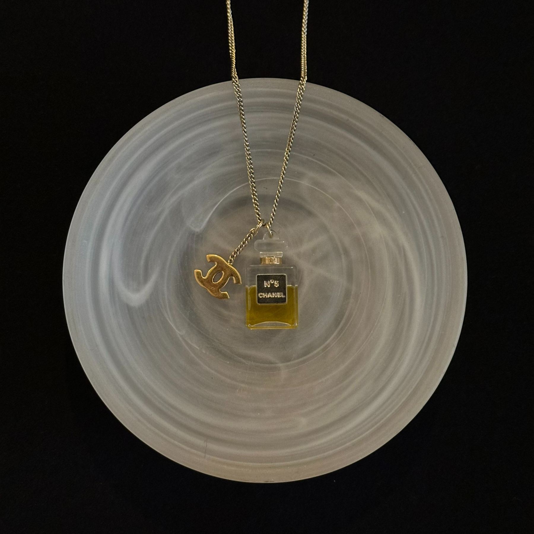 C logo perfume bottle necklace