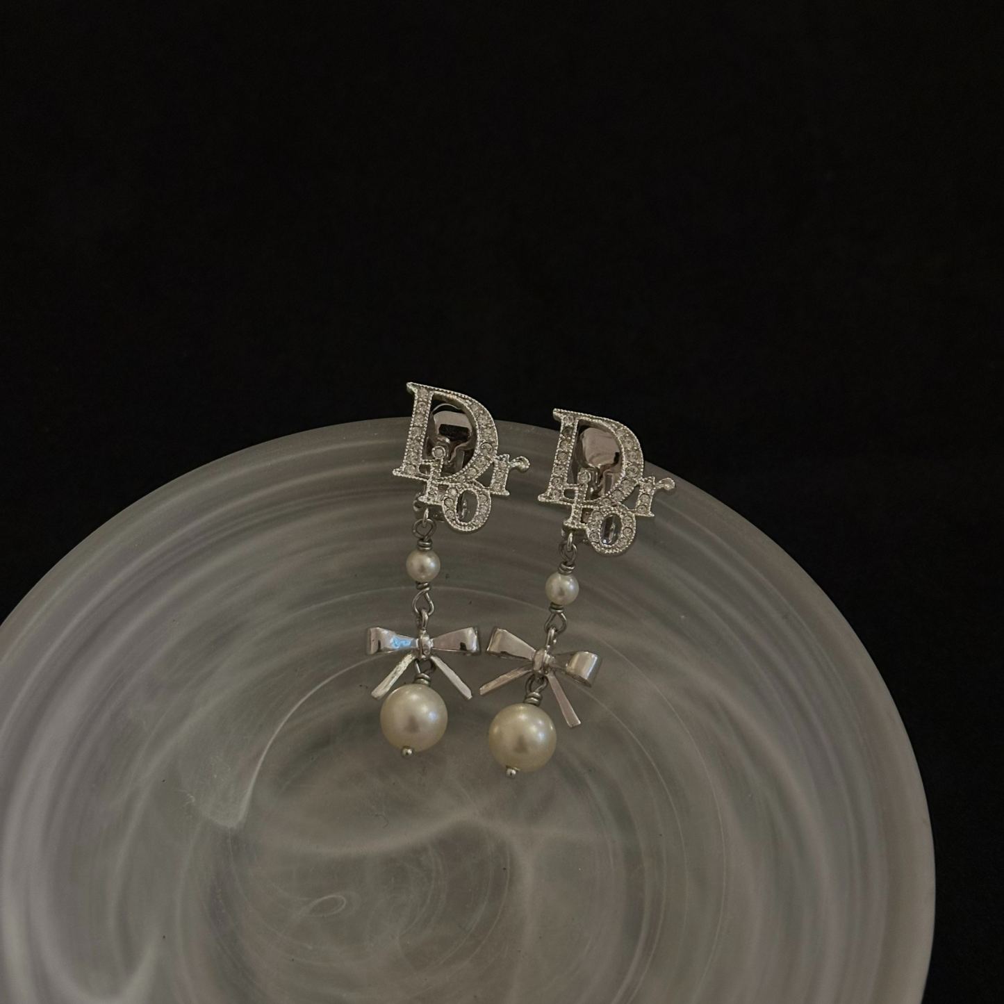 D Pearl and rhinestone bow Ear clips