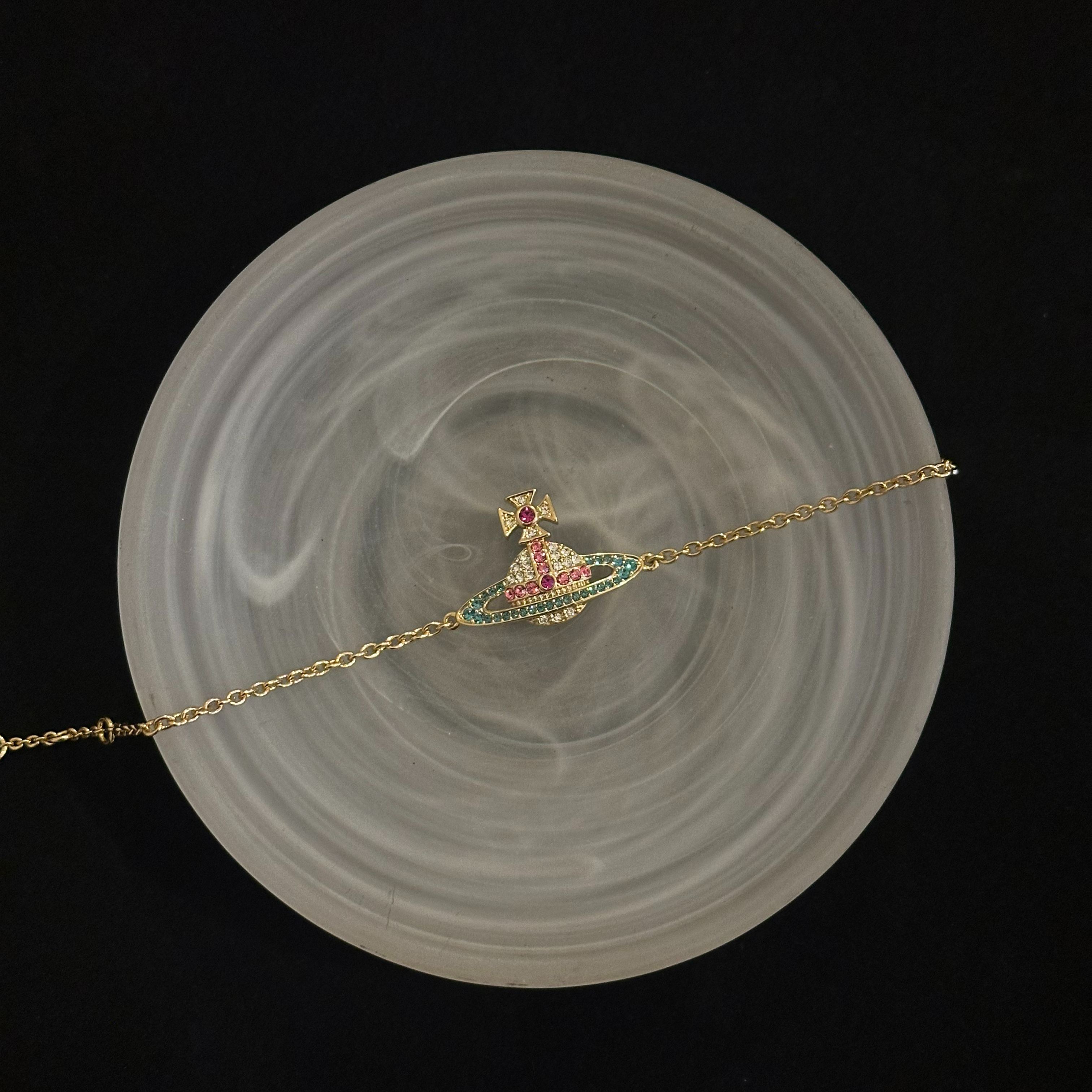 V Saturn colored diamond bracelet