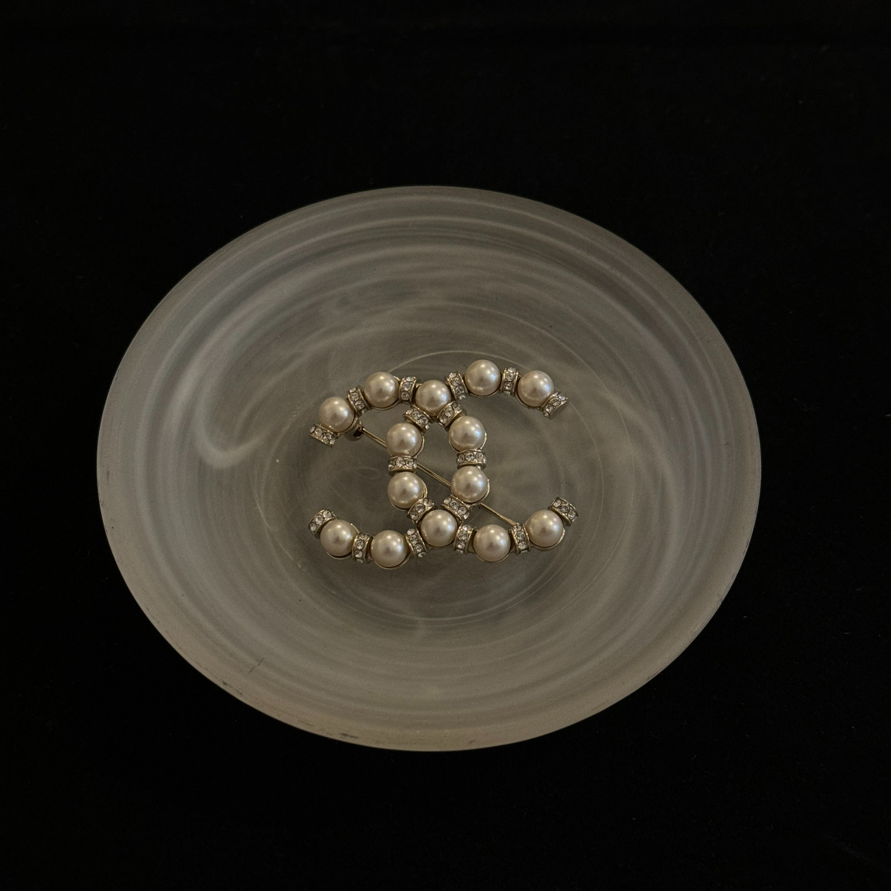 C Pearl and rhinestone brooch