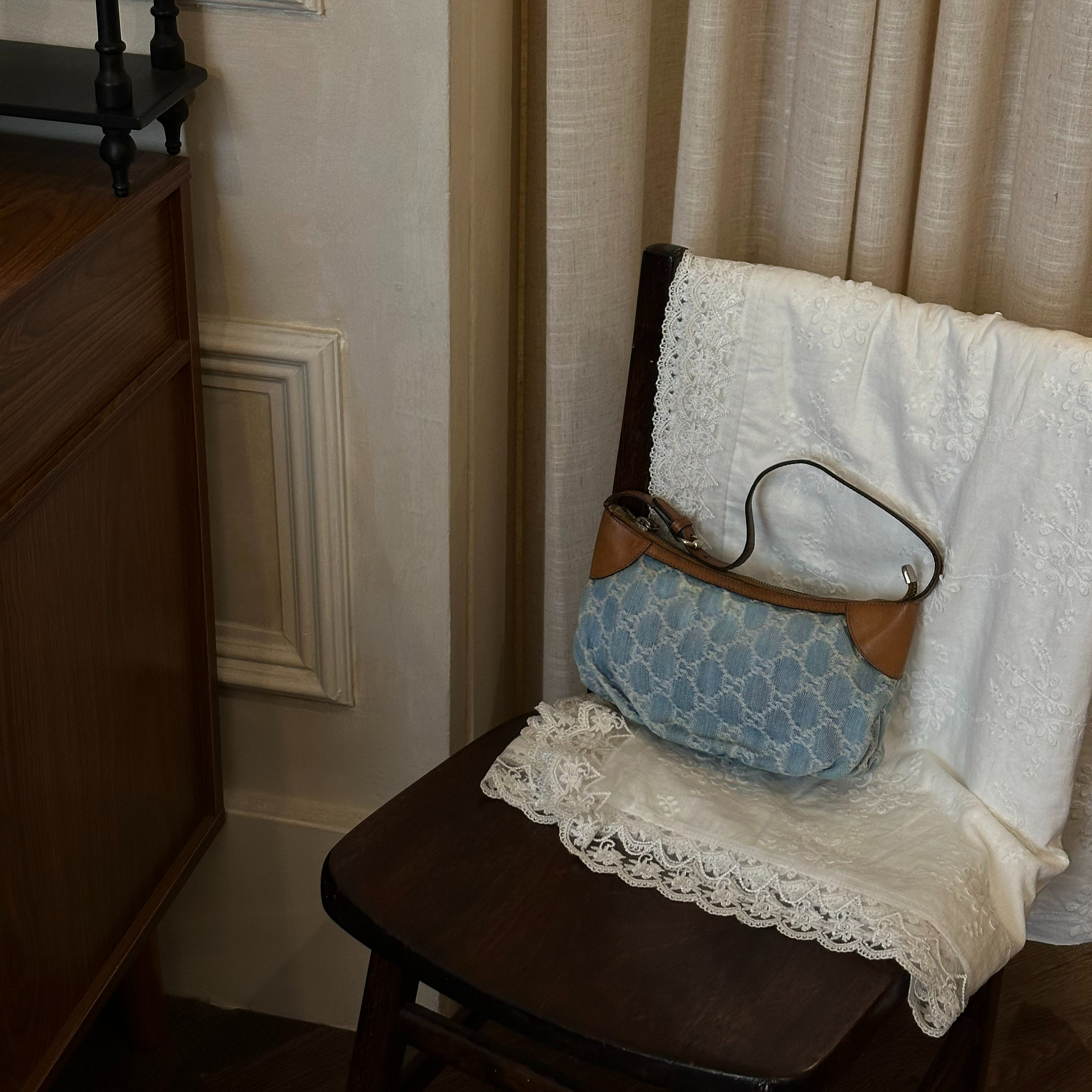 G Distressed denim shoulder bag