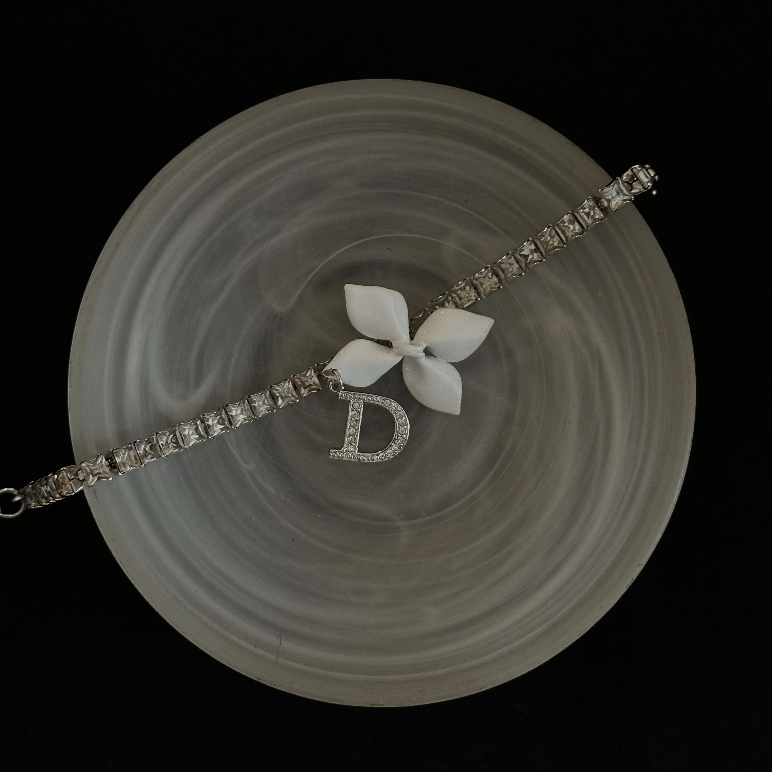 D Small white flower logo bracelet