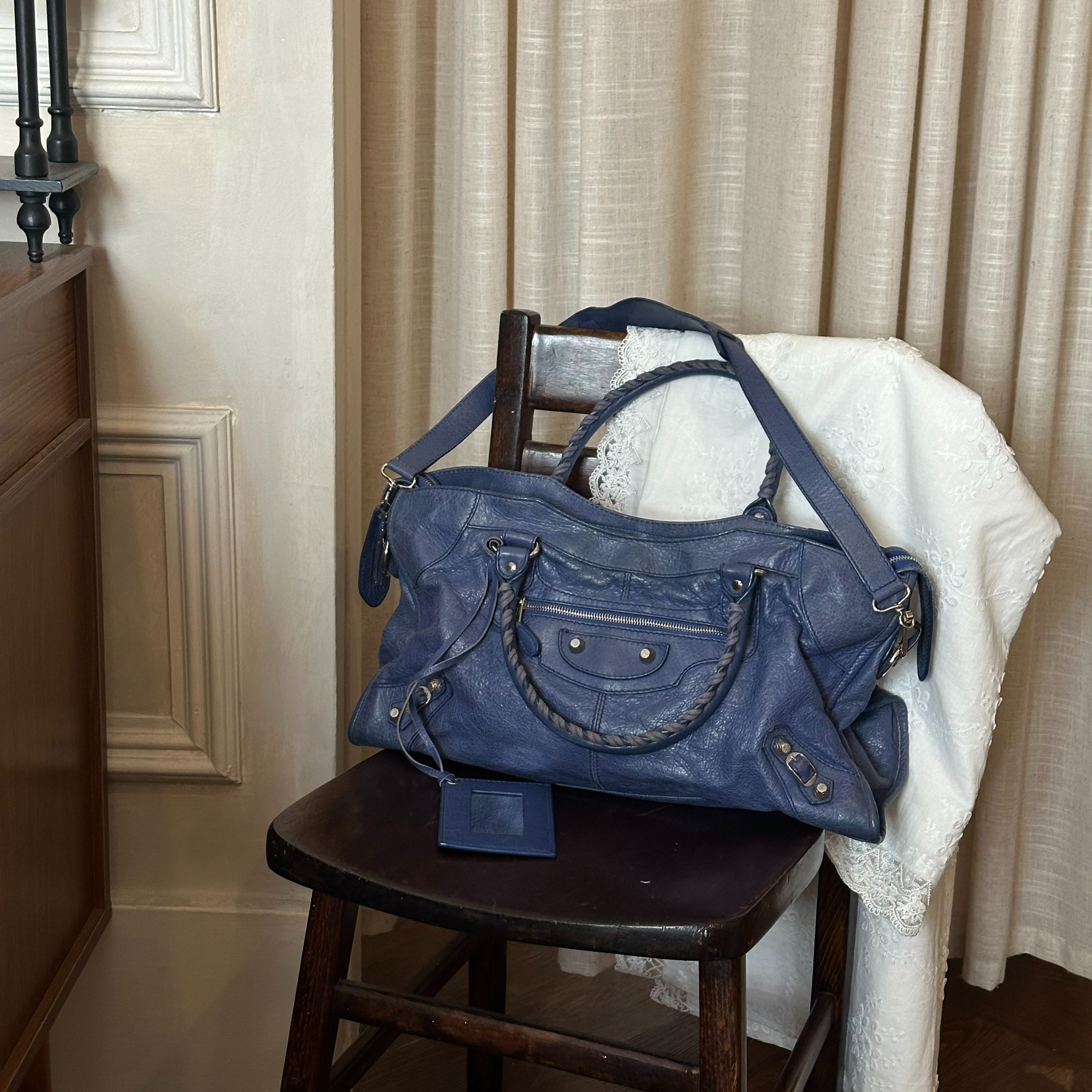 B Navy blue studded motorcycle bag